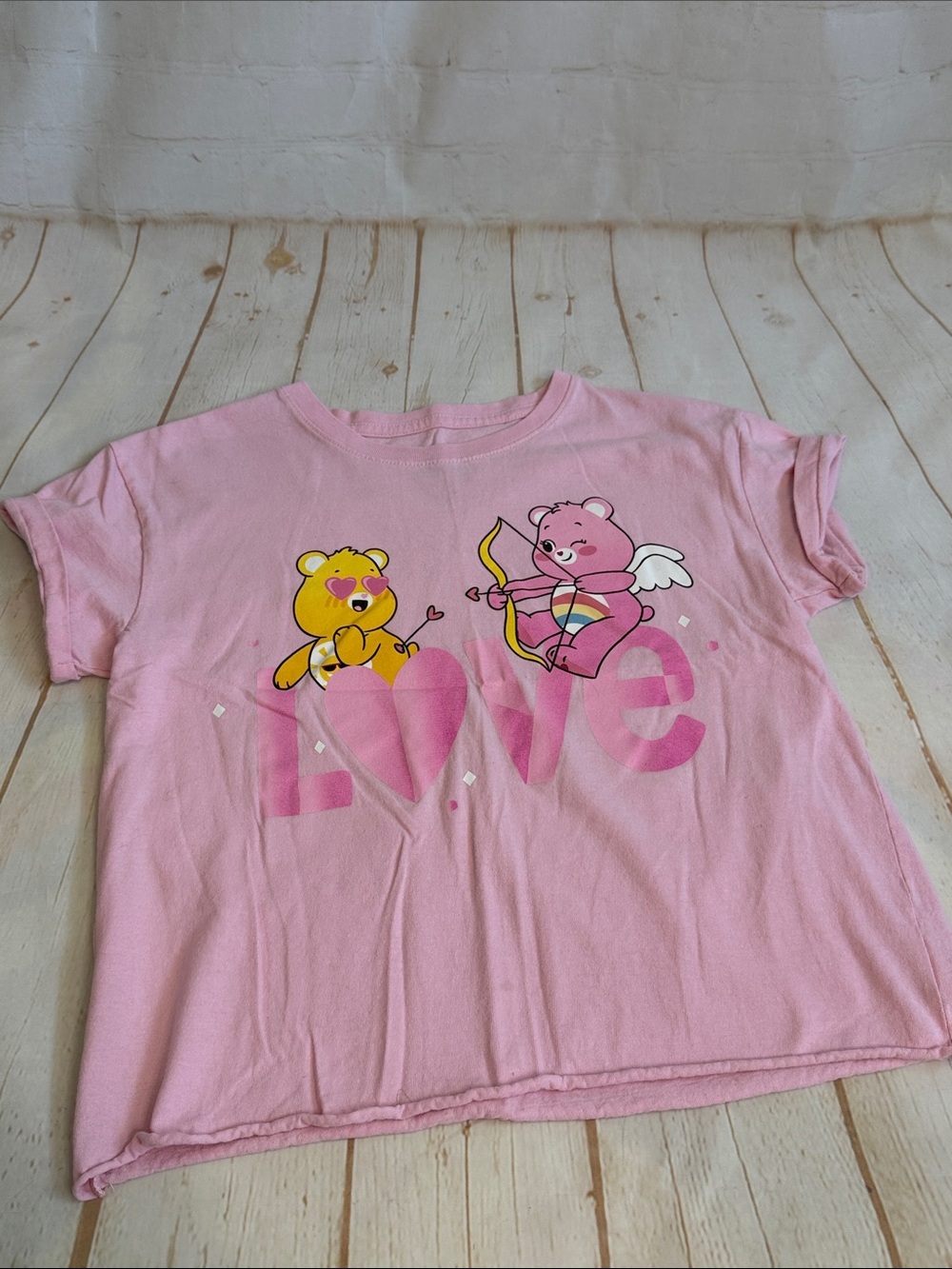 Pink Care Bears Unlock the Magic “Love” Cupid Graphic Kids Tee